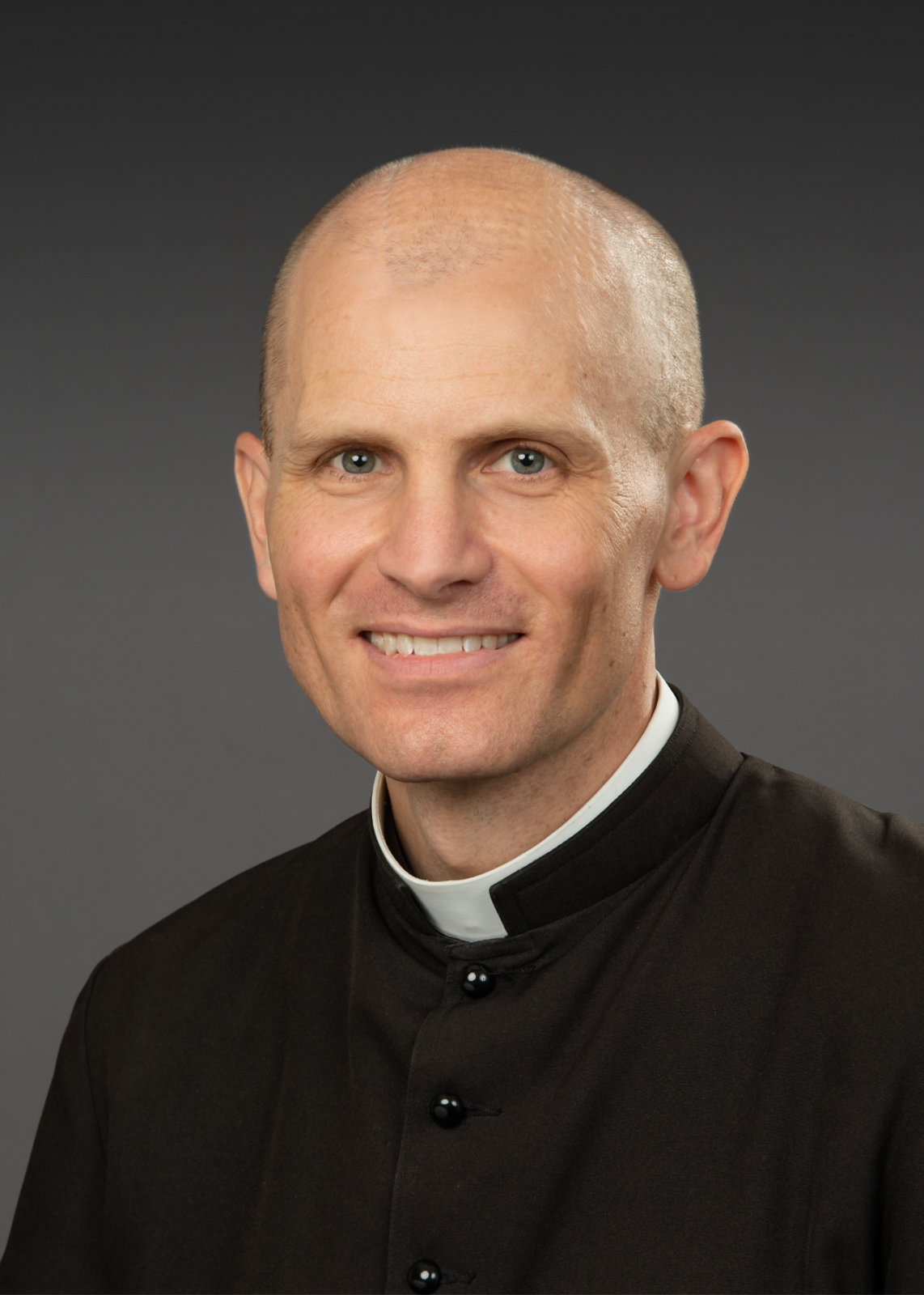 Father Hollowell formal (1)_edited.png